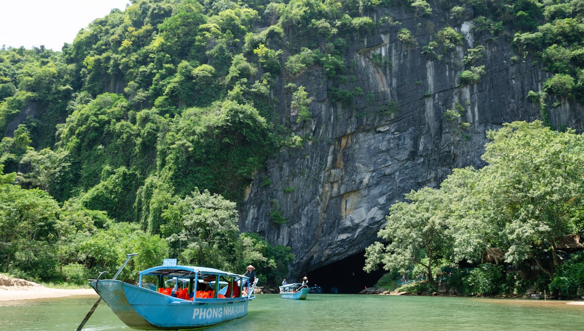 a group of people on a boat in the water