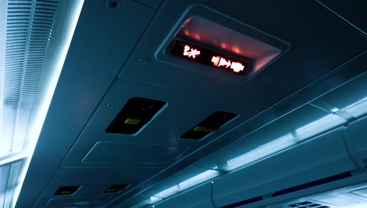 Premium economy aircraft cabin with wider seats and more legroom on long-haul flight