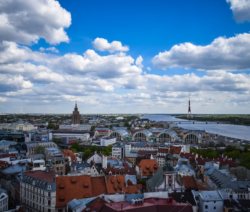 The Freedom Monument in Riga surrounded by spring blossoms
